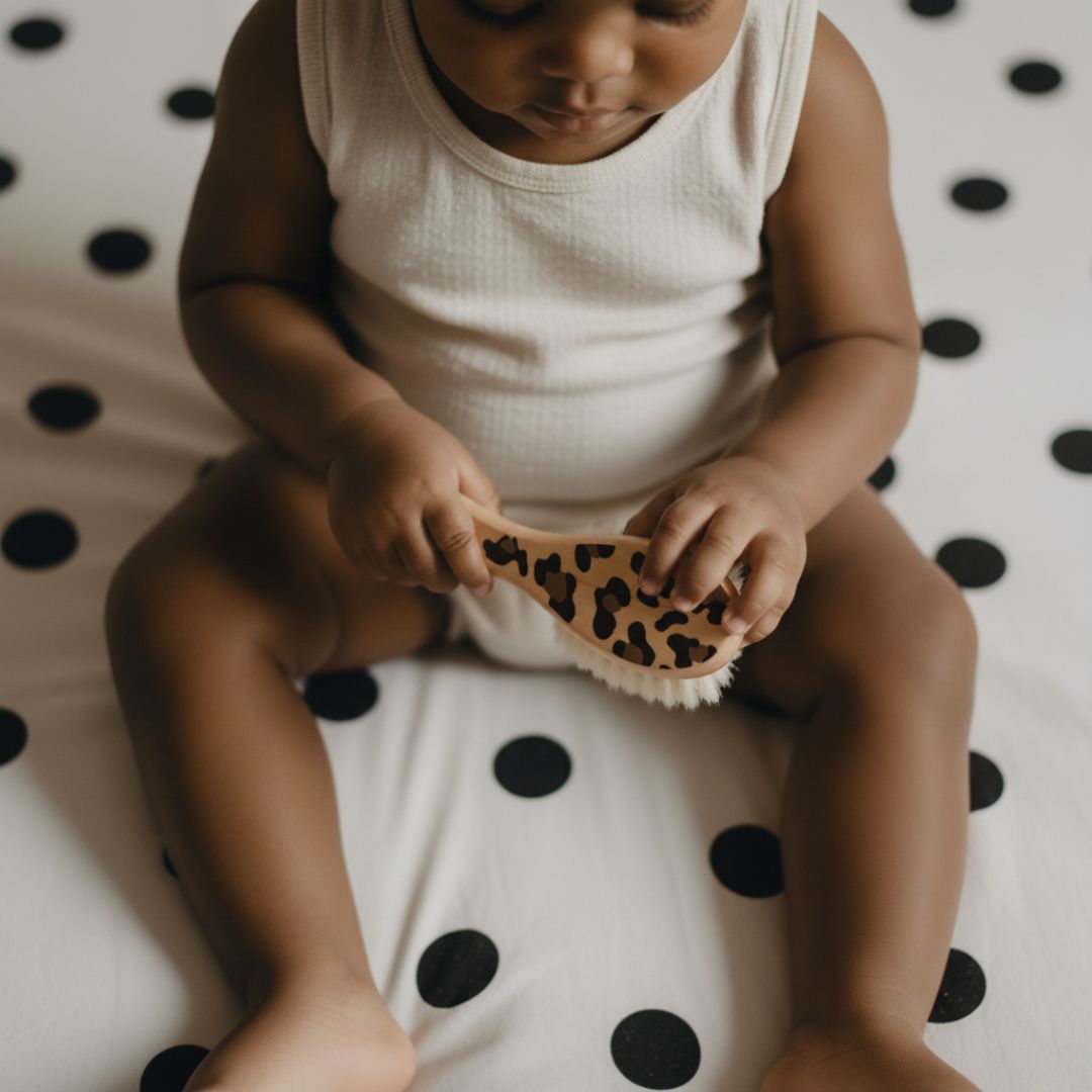 elh-e-babyb-rste-holz-leopard-graouu-0-24-monate image 3